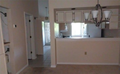 Indulge in comfort and convenience with this 2-bedroom on La Cita Country Club in Florida - for sale on GolfHomes.com, golf home, golf lot