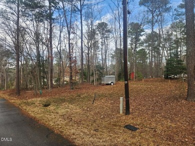 Come see this great double multi use lot! half the lot is on River Golf and Country Club at Lake Royale in North Carolina - for sale on GolfHomes.com, golf home, golf lot