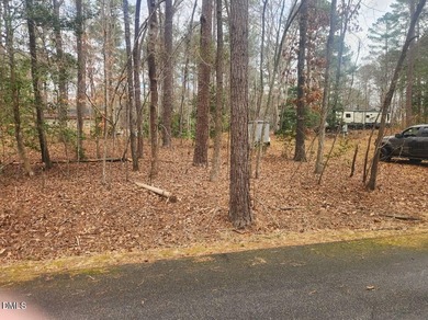 Come see this great double multi use lot! half the lot is on River Golf and Country Club at Lake Royale in North Carolina - for sale on GolfHomes.com, golf home, golf lot