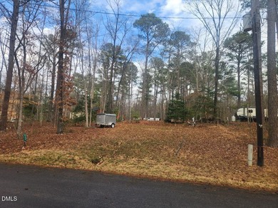 Come see this great double multi use lot! half the lot is on River Golf and Country Club at Lake Royale in North Carolina - for sale on GolfHomes.com, golf home, golf lot