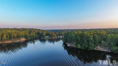 Come see this great double multi use lot! half the lot is on River Golf and Country Club at Lake Royale in North Carolina - for sale on GolfHomes.com, golf home, golf lot