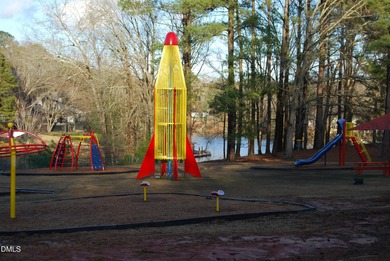 Come see this great double multi use lot! half the lot is on River Golf and Country Club at Lake Royale in North Carolina - for sale on GolfHomes.com, golf home, golf lot