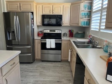 Check out this 3BR, 2.5 bath, townhome, 2 car garage, located in on The Legacy Golf and Tennis Club in Florida - for sale on GolfHomes.com, golf home, golf lot