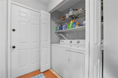 Vacation living at a price you'll love! This lower-level condo on The Highlands Course at Lake Arrowhead in Georgia - for sale on GolfHomes.com, golf home, golf lot