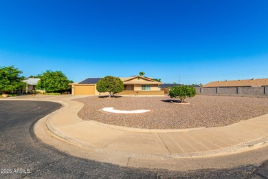 Huge lot. Swimming pool. Beautifully landscaped with grass. This on Sun City Country Club in Arizona - for sale on GolfHomes.com, golf home, golf lot