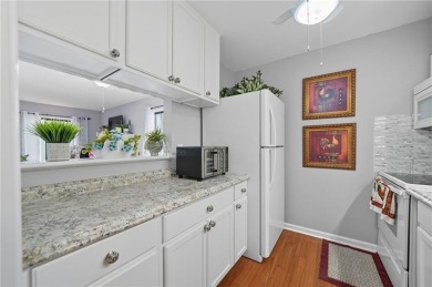 Vacation living at a price you'll love! This lower-level condo on The Highlands Course at Lake Arrowhead in Georgia - for sale on GolfHomes.com, golf home, golf lot