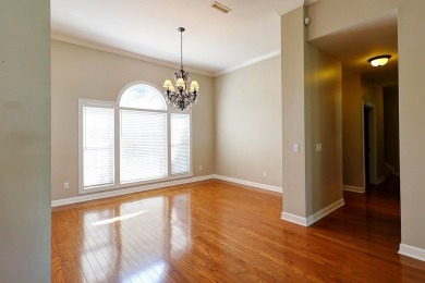 Nestled within the prestigious Robert Trent Jones Golf Course on Highland Oaks Golf Course in Alabama - for sale on GolfHomes.com, golf home, golf lot