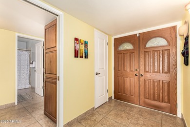 Huge lot. Swimming pool. Beautifully landscaped with grass. This on Sun City Country Club in Arizona - for sale on GolfHomes.com, golf home, golf lot