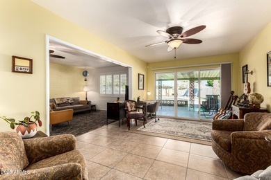 Huge lot. Swimming pool. Beautifully landscaped with grass. This on Sun City Country Club in Arizona - for sale on GolfHomes.com, golf home, golf lot