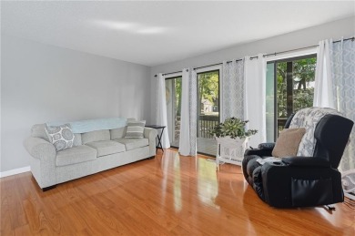 Vacation living at a price you'll love! This lower-level condo on The Highlands Course at Lake Arrowhead in Georgia - for sale on GolfHomes.com, golf home, golf lot