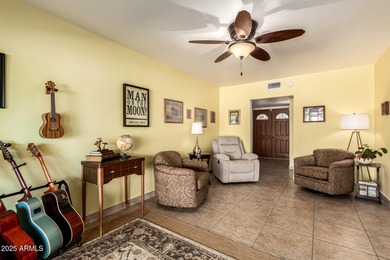 Huge lot. Swimming pool. Beautifully landscaped with grass. This on Sun City Country Club in Arizona - for sale on GolfHomes.com, golf home, golf lot