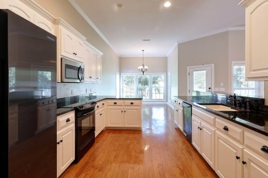 Nestled within the prestigious Robert Trent Jones Golf Course on Highland Oaks Golf Course in Alabama - for sale on GolfHomes.com, golf home, golf lot