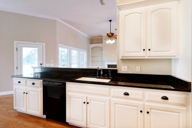 Nestled within the prestigious Robert Trent Jones Golf Course on Highland Oaks Golf Course in Alabama - for sale on GolfHomes.com, golf home, golf lot