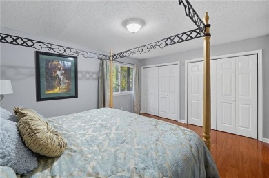 Vacation living at a price you'll love! This lower-level condo on The Highlands Course at Lake Arrowhead in Georgia - for sale on GolfHomes.com, golf home, golf lot