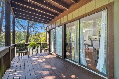 Vacation living at a price you'll love! This lower-level condo on The Highlands Course at Lake Arrowhead in Georgia - for sale on GolfHomes.com, golf home, golf lot
