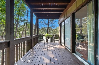 Vacation living at a price you'll love! This lower-level condo on The Highlands Course at Lake Arrowhead in Georgia - for sale on GolfHomes.com, golf home, golf lot