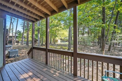 Vacation living at a price you'll love! This lower-level condo on The Highlands Course at Lake Arrowhead in Georgia - for sale on GolfHomes.com, golf home, golf lot