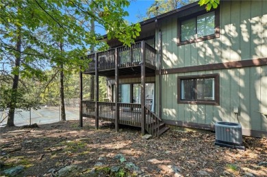 Vacation living at a price you'll love! This lower-level condo on The Highlands Course at Lake Arrowhead in Georgia - for sale on GolfHomes.com, golf home, golf lot