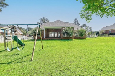 Nestled within the prestigious Robert Trent Jones Golf Course on Highland Oaks Golf Course in Alabama - for sale on GolfHomes.com, golf home, golf lot