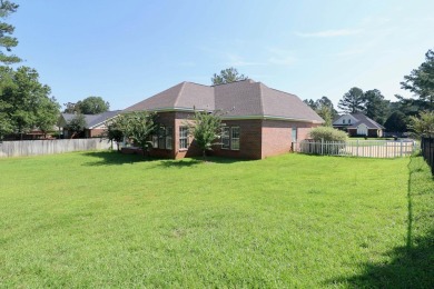 Nestled within the prestigious Robert Trent Jones Golf Course on Highland Oaks Golf Course in Alabama - for sale on GolfHomes.com, golf home, golf lot