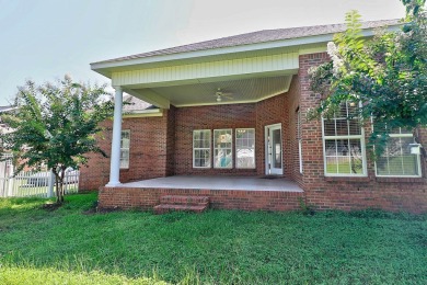 Nestled within the prestigious Robert Trent Jones Golf Course on Highland Oaks Golf Course in Alabama - for sale on GolfHomes.com, golf home, golf lot