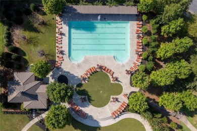 Vacation living at a price you'll love! This lower-level condo on The Highlands Course at Lake Arrowhead in Georgia - for sale on GolfHomes.com, golf home, golf lot