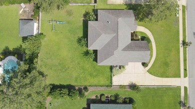 Nestled within the prestigious Robert Trent Jones Golf Course on Highland Oaks Golf Course in Alabama - for sale on GolfHomes.com, golf home, golf lot