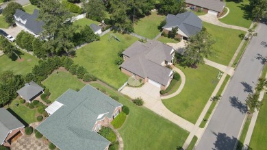 Nestled within the prestigious Robert Trent Jones Golf Course on Highland Oaks Golf Course in Alabama - for sale on GolfHomes.com, golf home, golf lot