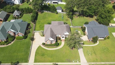 Nestled within the prestigious Robert Trent Jones Golf Course on Highland Oaks Golf Course in Alabama - for sale on GolfHomes.com, golf home, golf lot