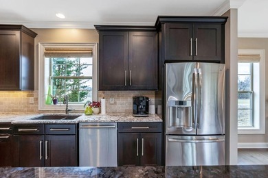 Gracefully positioned along the championship fairways of New on New Albany Links Golf Club in Ohio - for sale on GolfHomes.com, golf home, golf lot