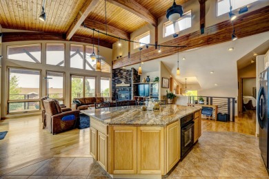 Welcome to 15 Beartooth Drive, an exquisite custom home nestled on The Powder Horn Golf Club - Mountain in Wyoming - for sale on GolfHomes.com, golf home, golf lot