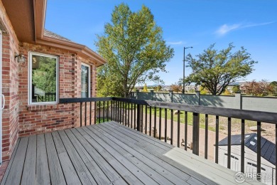 All-brick charmer on a cul-de-sac! This gorgeous home in the on The Olde Course At Loveland in Colorado - for sale on GolfHomes.com, golf home, golf lot