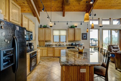 Welcome to 15 Beartooth Drive, an exquisite custom home nestled on The Powder Horn Golf Club - Mountain in Wyoming - for sale on GolfHomes.com, golf home, golf lot