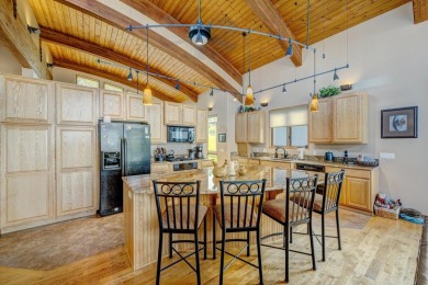 Welcome to 15 Beartooth Drive, an exquisite custom home nestled on The Powder Horn Golf Club - Mountain in Wyoming - for sale on GolfHomes.com, golf home, golf lot