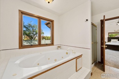 All-brick charmer on a cul-de-sac! This gorgeous home in the on The Olde Course At Loveland in Colorado - for sale on GolfHomes.com, golf home, golf lot