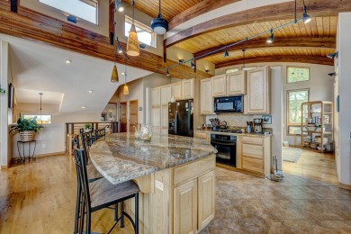 Welcome to 15 Beartooth Drive, an exquisite custom home nestled on The Powder Horn Golf Club - Mountain in Wyoming - for sale on GolfHomes.com, golf home, golf lot