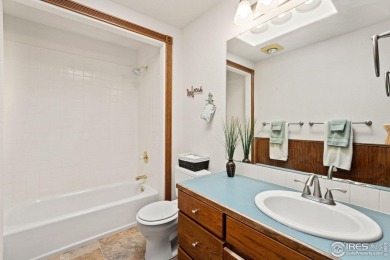 All-brick charmer on a cul-de-sac! This gorgeous home in the on The Olde Course At Loveland in Colorado - for sale on GolfHomes.com, golf home, golf lot
