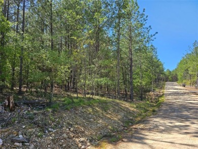 Lot 125 in Lost Creek North, nestled within the serene beauty of on Cedar Creek Golf Course At Beavers Bend State Park in Oklahoma - for sale on GolfHomes.com, golf home, golf lot