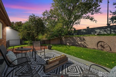 All-brick charmer on a cul-de-sac! This gorgeous home in the on The Olde Course At Loveland in Colorado - for sale on GolfHomes.com, golf home, golf lot