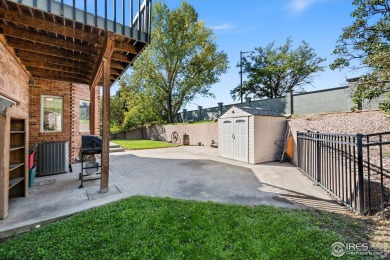 All-brick charmer on a cul-de-sac! This gorgeous home in the on The Olde Course At Loveland in Colorado - for sale on GolfHomes.com, golf home, golf lot