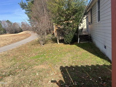 ***CASH OR INVESTOR BUYERS ONLY. SOLD AS IS. *** Enjoy peaceful on Hedingham Golf and Athletic Club in North Carolina - for sale on GolfHomes.com, golf home, golf lot