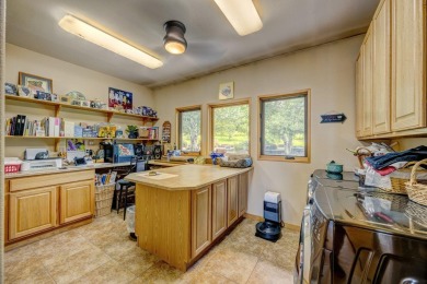 Welcome to 15 Beartooth Drive, an exquisite custom home nestled on The Powder Horn Golf Club - Mountain in Wyoming - for sale on GolfHomes.com, golf home, golf lot