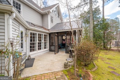 Stunning beauty surrounds this graceful home in Brookstone on Brookstone Golf and Country Club in Georgia - for sale on GolfHomes.com, golf home, golf lot