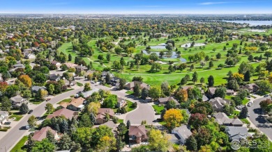 All-brick charmer on a cul-de-sac! This gorgeous home in the on The Olde Course At Loveland in Colorado - for sale on GolfHomes.com, golf home, golf lot