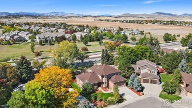 All-brick charmer on a cul-de-sac! This gorgeous home in the on The Olde Course At Loveland in Colorado - for sale on GolfHomes.com, golf home, golf lot