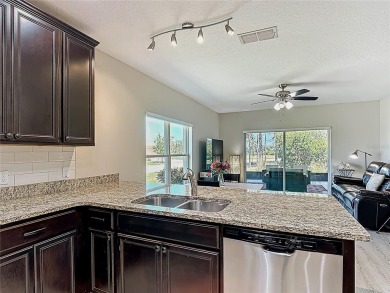 **See the FULL LENGTH VIDEO on Tour Link 1.** LOCATION, LOCATION on Stonegate Golf Club in Florida - for sale on GolfHomes.com, golf home, golf lot