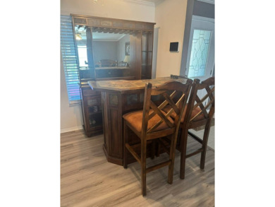This one grabs your attention immediately as you approach the on Golden Lakes Golf Course in Florida - for sale on GolfHomes.com, golf home, golf lot