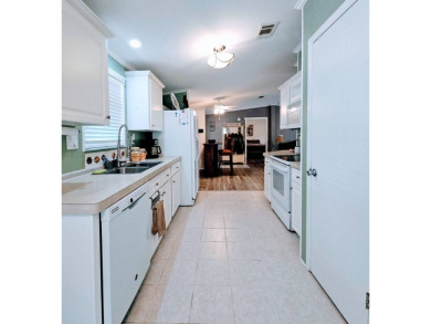 This one grabs your attention immediately as you approach the on Golden Lakes Golf Course in Florida - for sale on GolfHomes.com, golf home, golf lot