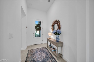 Welcome to luxurious living in the prestigious gated and guarded on Old Corkscrew Golf Club in Florida - for sale on GolfHomes.com, golf home, golf lot