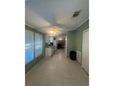 This one grabs your attention immediately as you approach the on Golden Lakes Golf Course in Florida - for sale on GolfHomes.com, golf home, golf lot